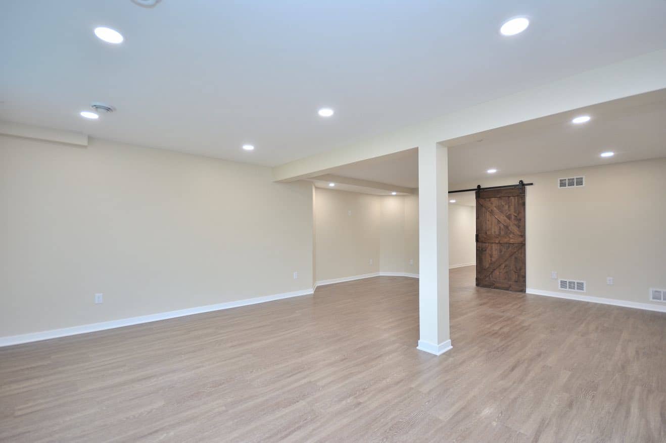 basement remodel with new flooring and walls