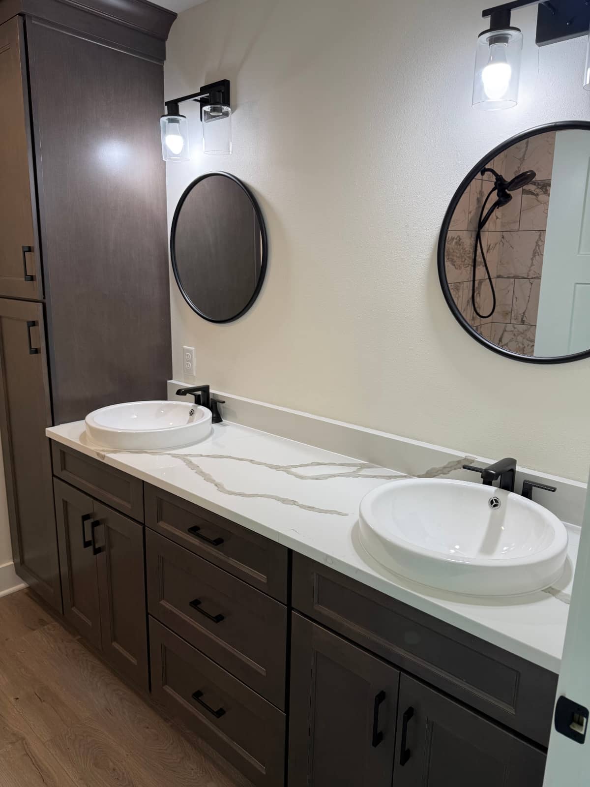 bathroom remodel with two sinks installed side by side
