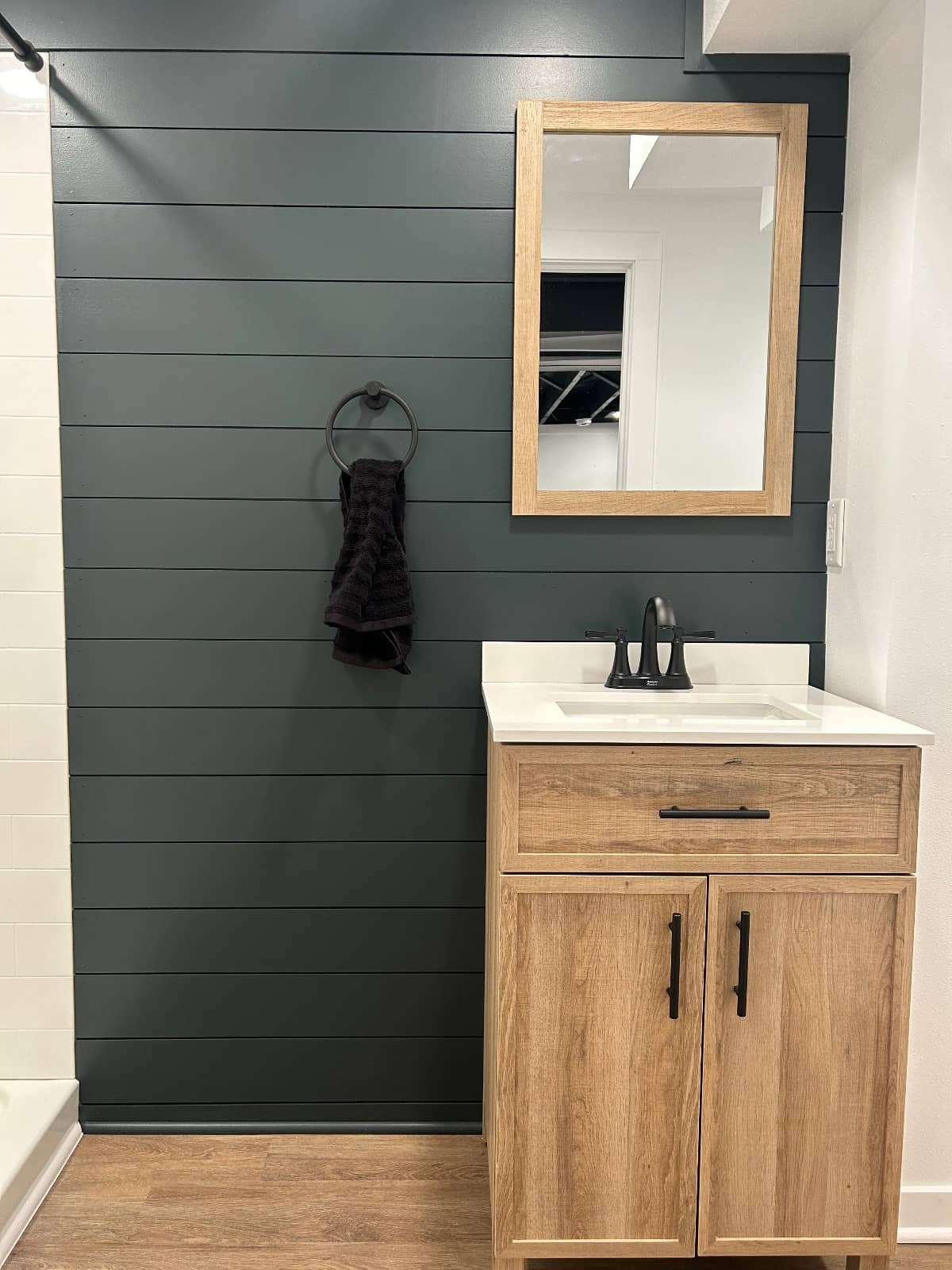 bathroom remodel with green walls